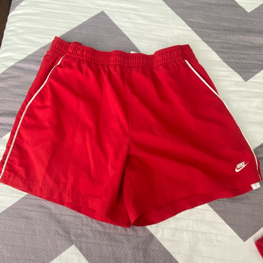 red nike shorts